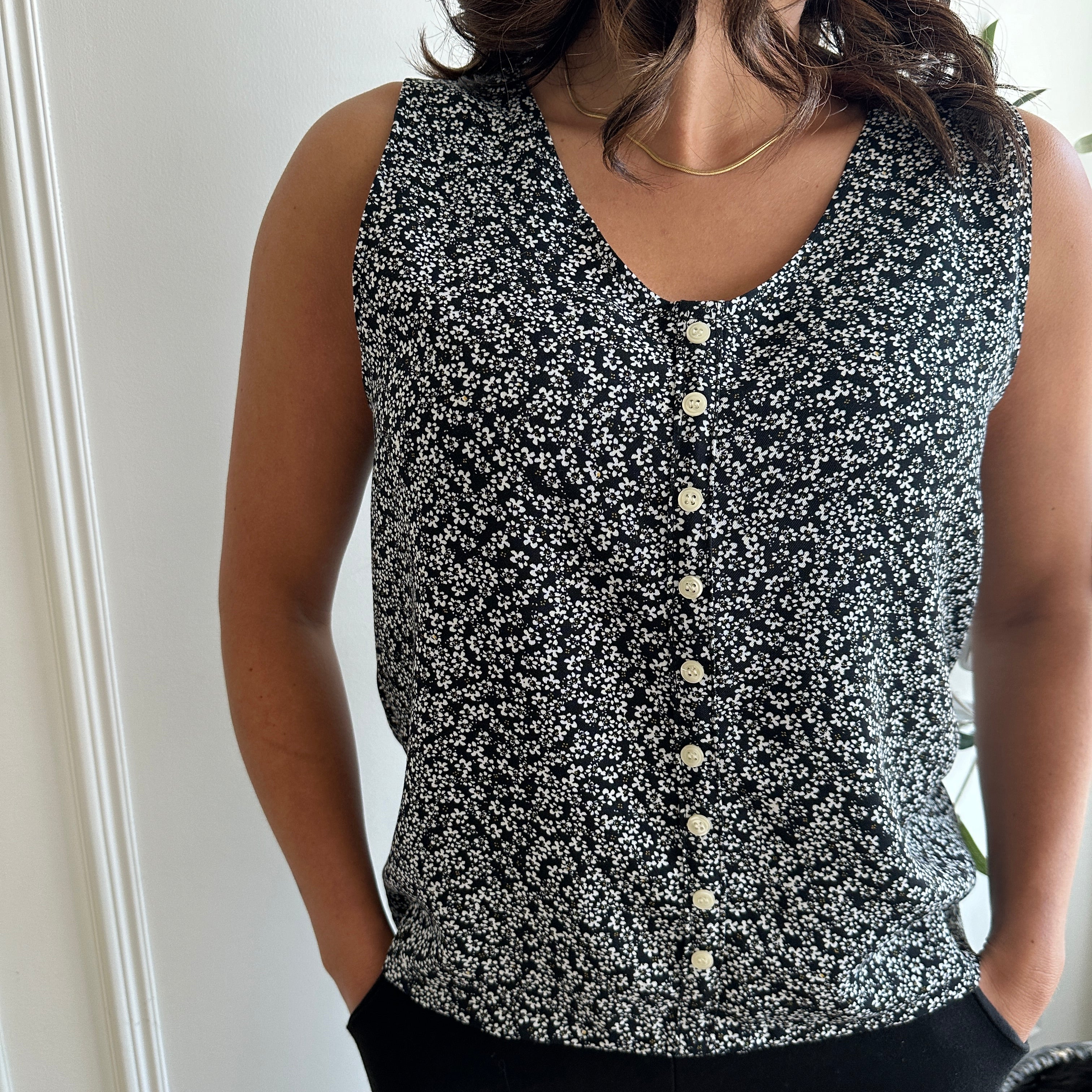 black and white floral loose fitting tank top with white buttons