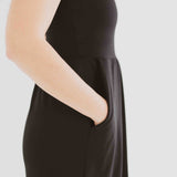 side view of black square neck tank dress with pockets clothing made in canada