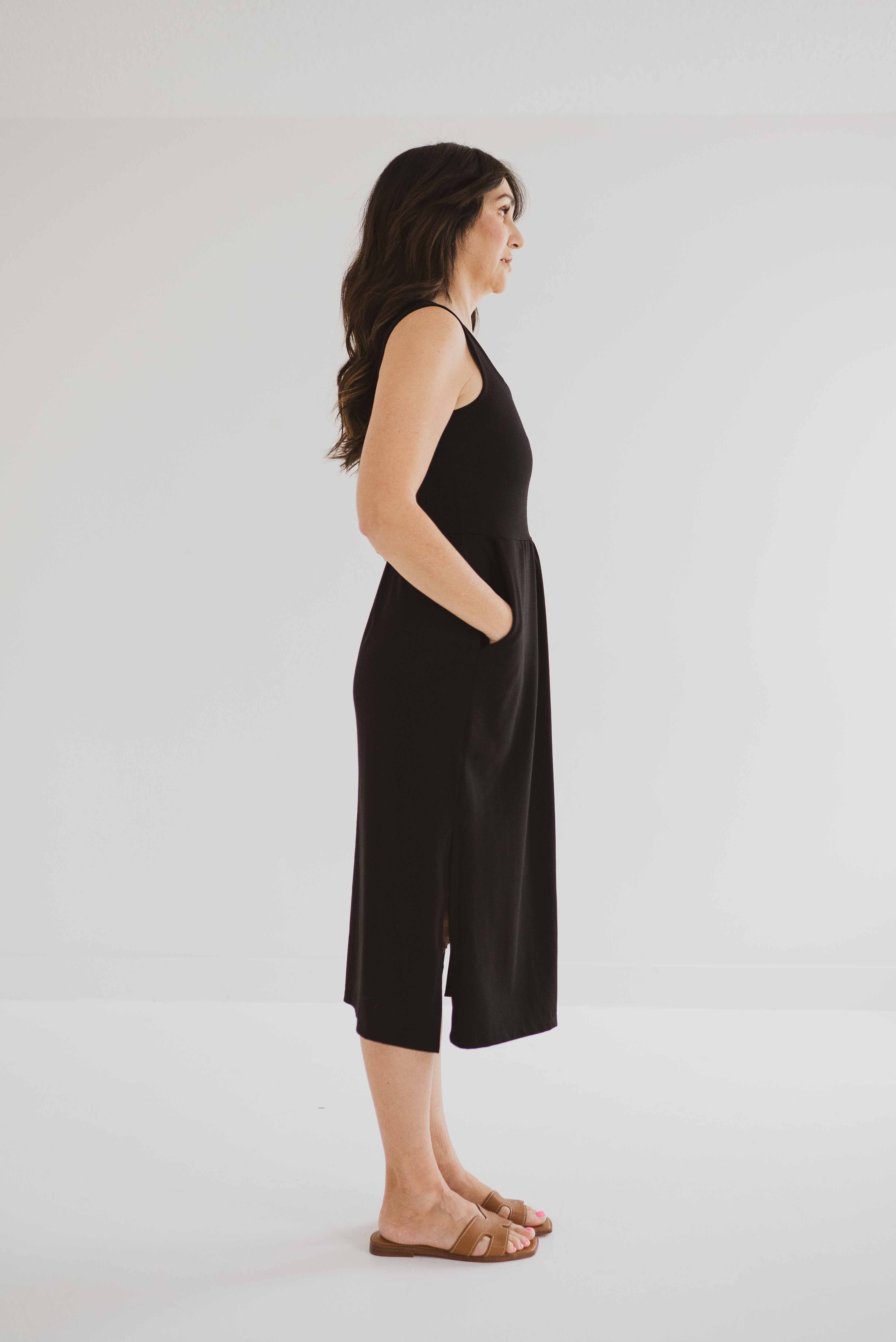 side view of black square neck tank dress with pockets clothing made in canada
