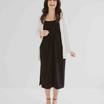 carolina cardigan in cream worn over black tank dress made in canada
