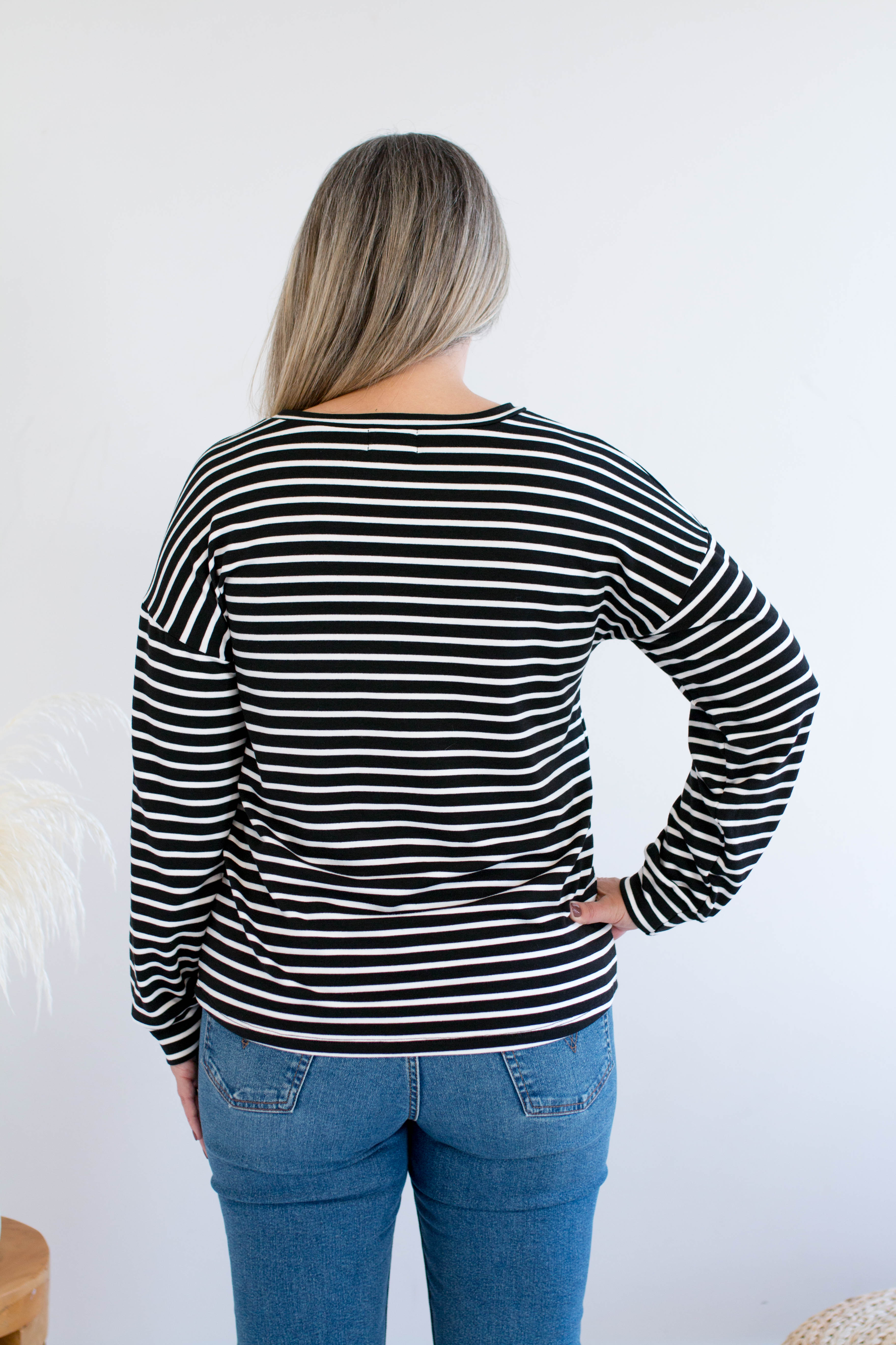 Black and white striped sweatshirt made in Canada back view