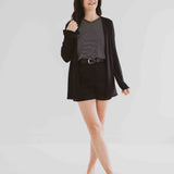 made in Canada cardigan for women with black and white striped t-shirt and black shorts