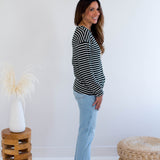 Black and white striped sweatshirt made in Canada side view