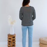 Back view of Black and white striped sweatshirt made in Canada 
