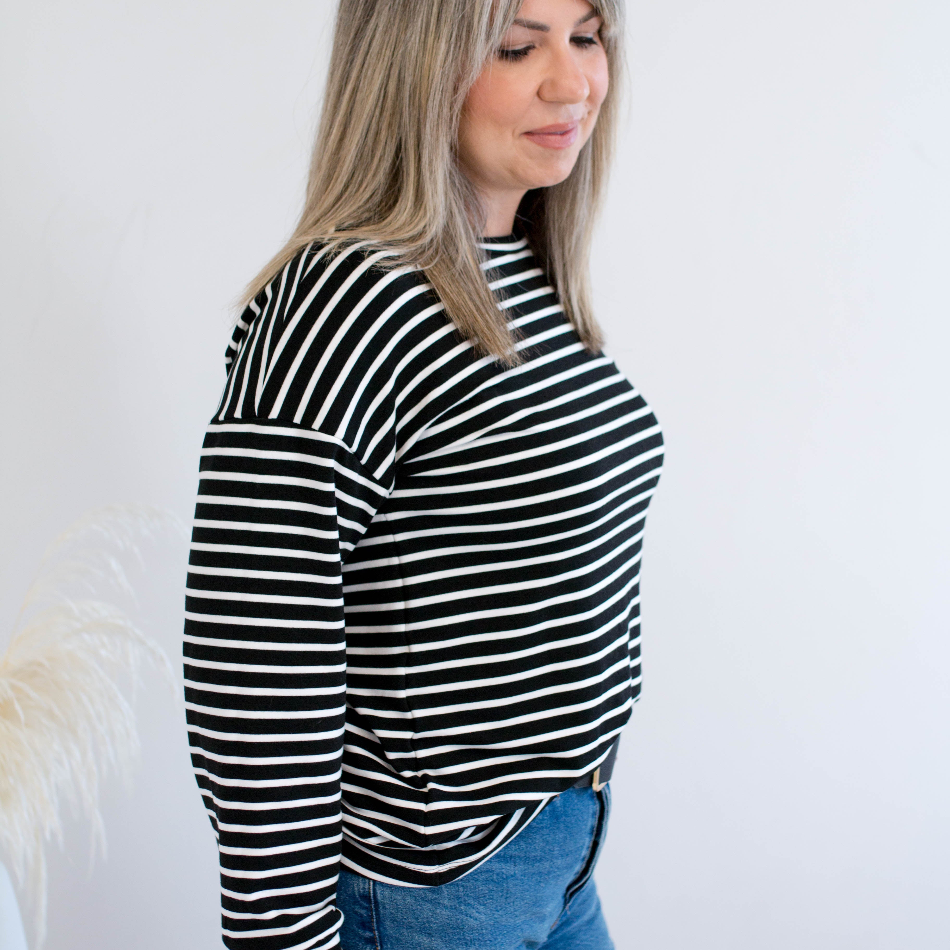 Black and white striped sweatshirt made in Canada side