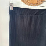 Close up of black midi skirt made in canada
