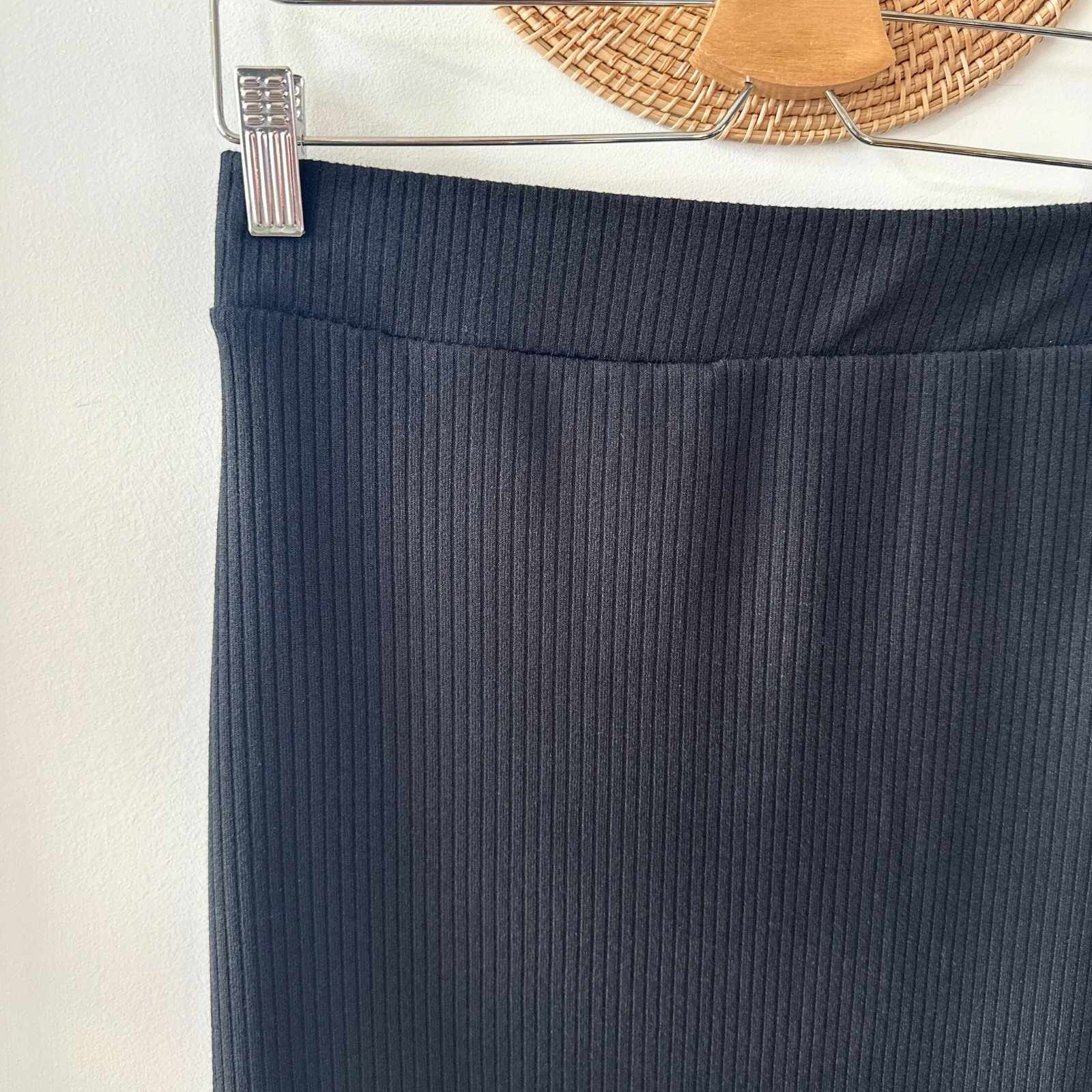 Close up of black midi skirt made in canada