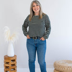 Black and white striped sweatshirt made in Canada with jeans 