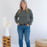 Black and white striped sweatshirt made in Canada with jeans 