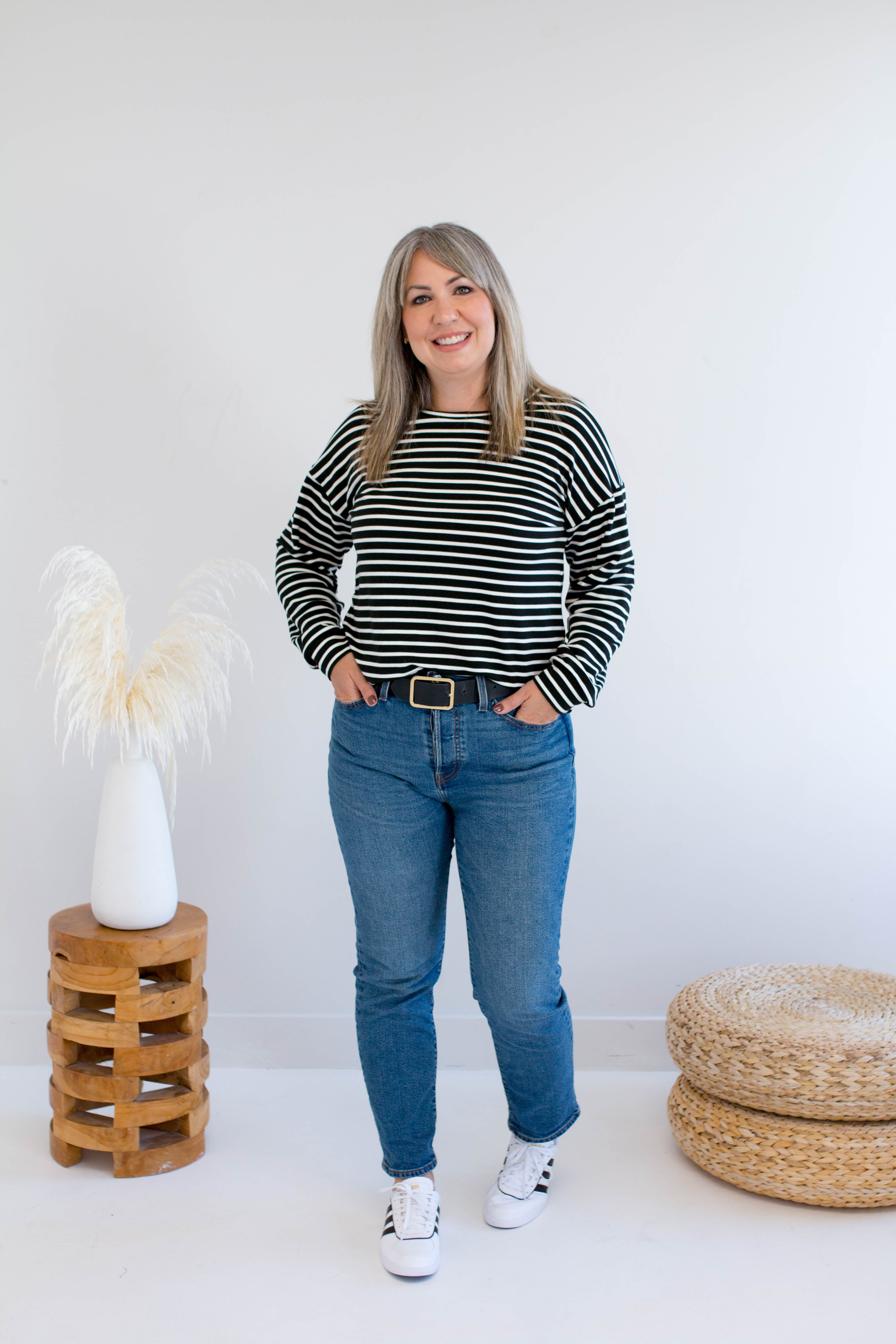 Black and white striped sweatshirt made in Canada with jeans 