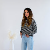 Black and white striped sweater with jeans made in Canada 