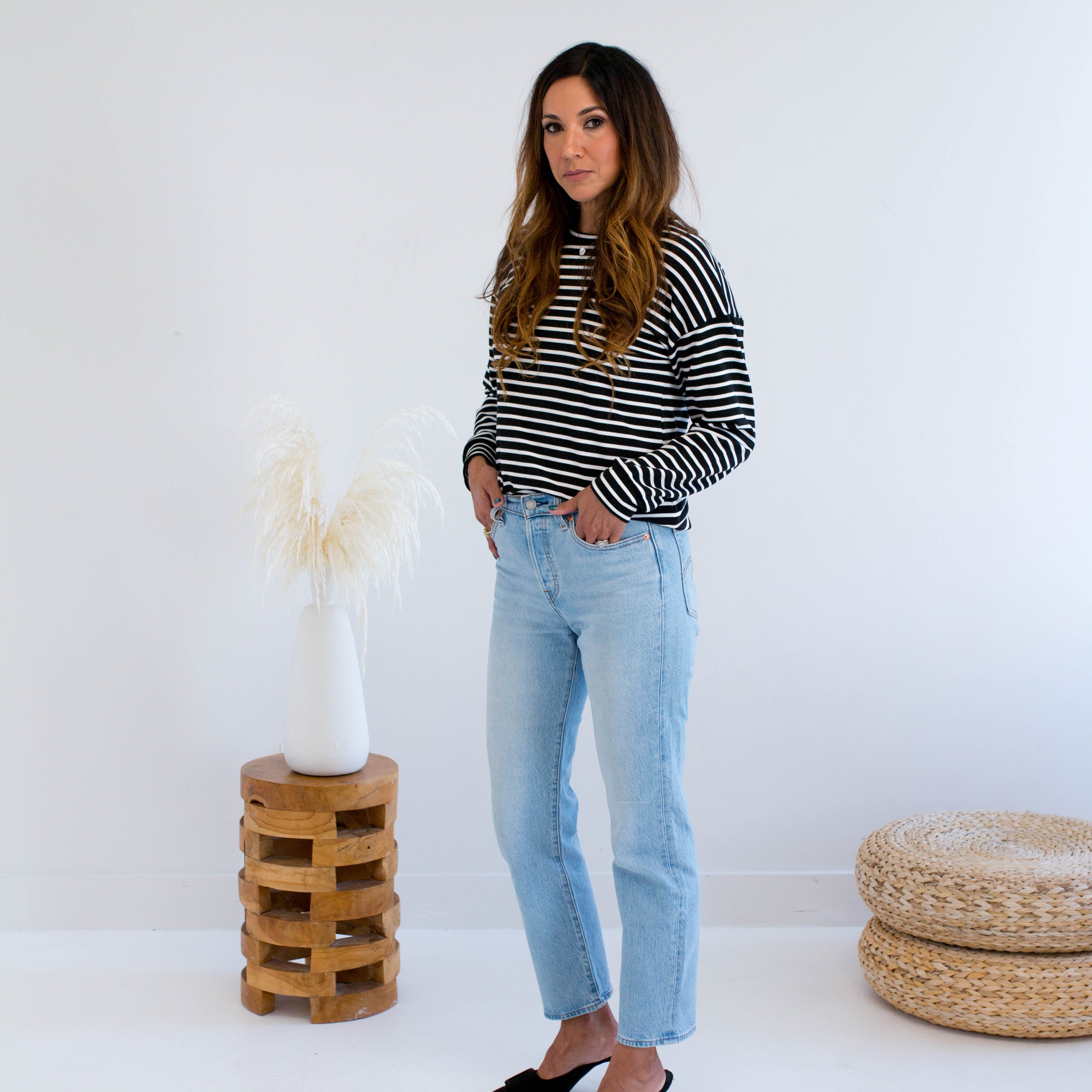 Black and white striped sweater with jeans made in Canada 