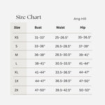 Ang Hill size chart table showing measurements for sizes XS through 2X, with columns for Size, Bust, Waist, and Hip on a light gray background.