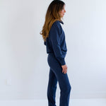 Side View. Ang Hill woman wearing navy blue bamboo loungewear set. Made in Canada