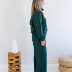 Side view. Ang Hill woman wearing green bamboo loungewear set. Made in Canada