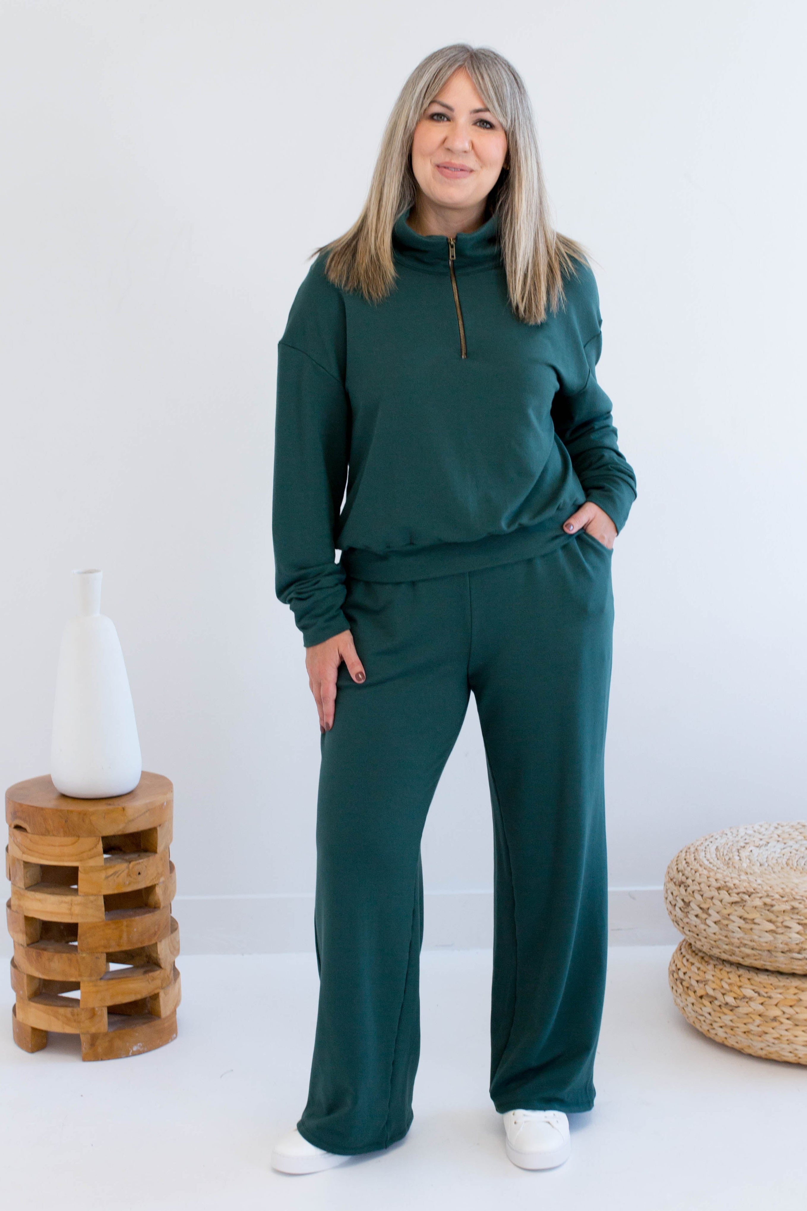 Ang Hill woman wearing green bamboo loungewear set. Made in Canada