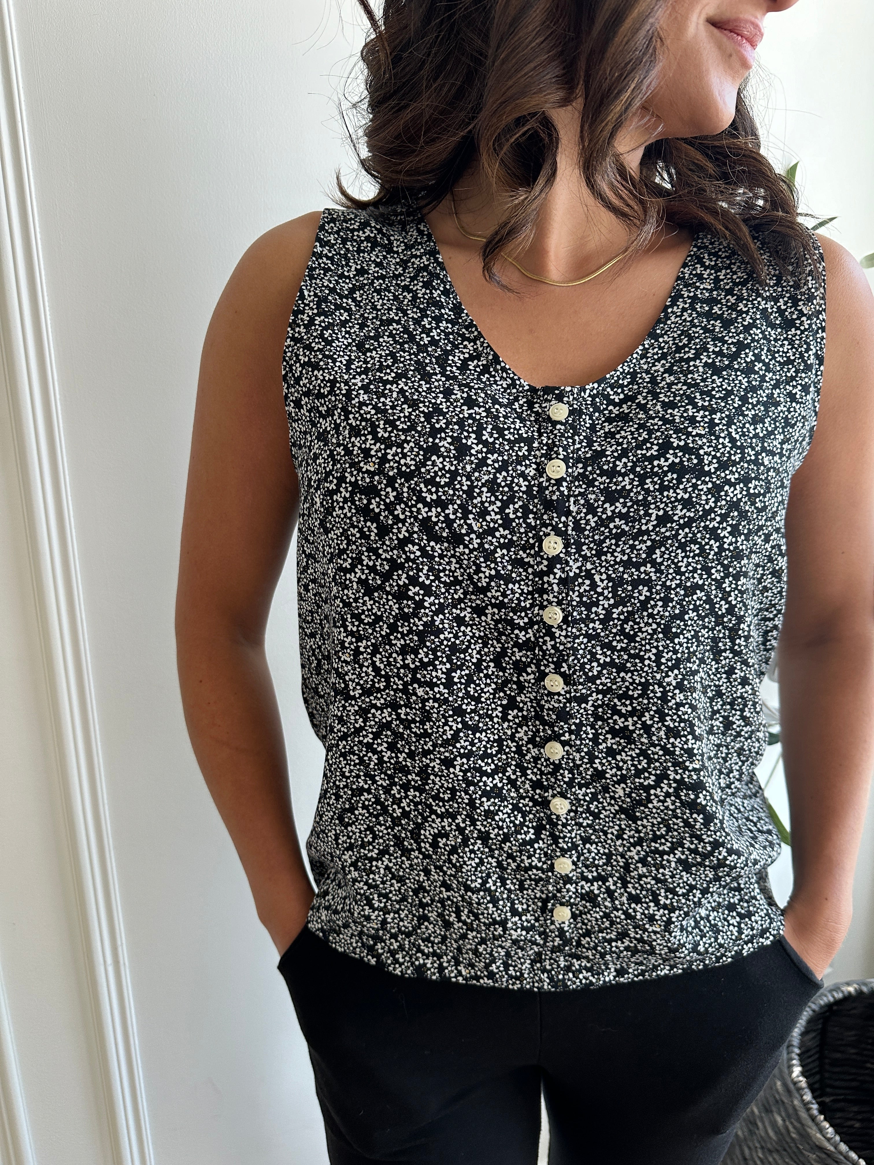 black and white floral loose fitting tank top with white buttons