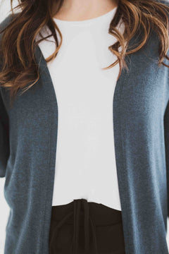 Close up of teal cardigan made in canada