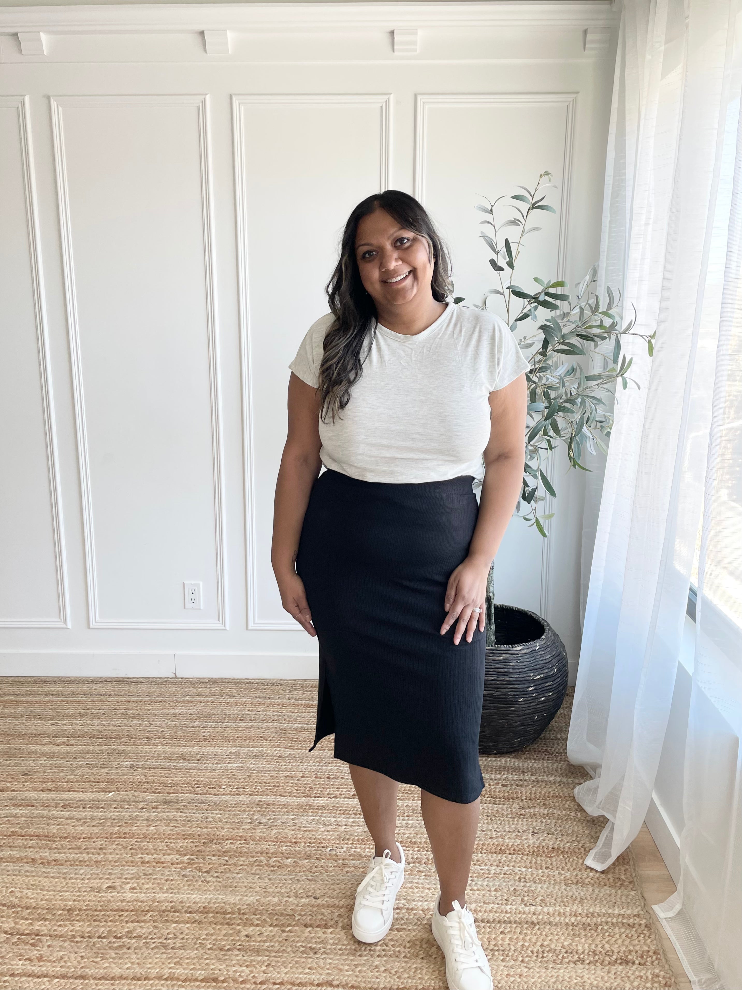  black midi skirt and crewneck t-shirt