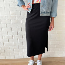 close up of black midi ribbed skirt 