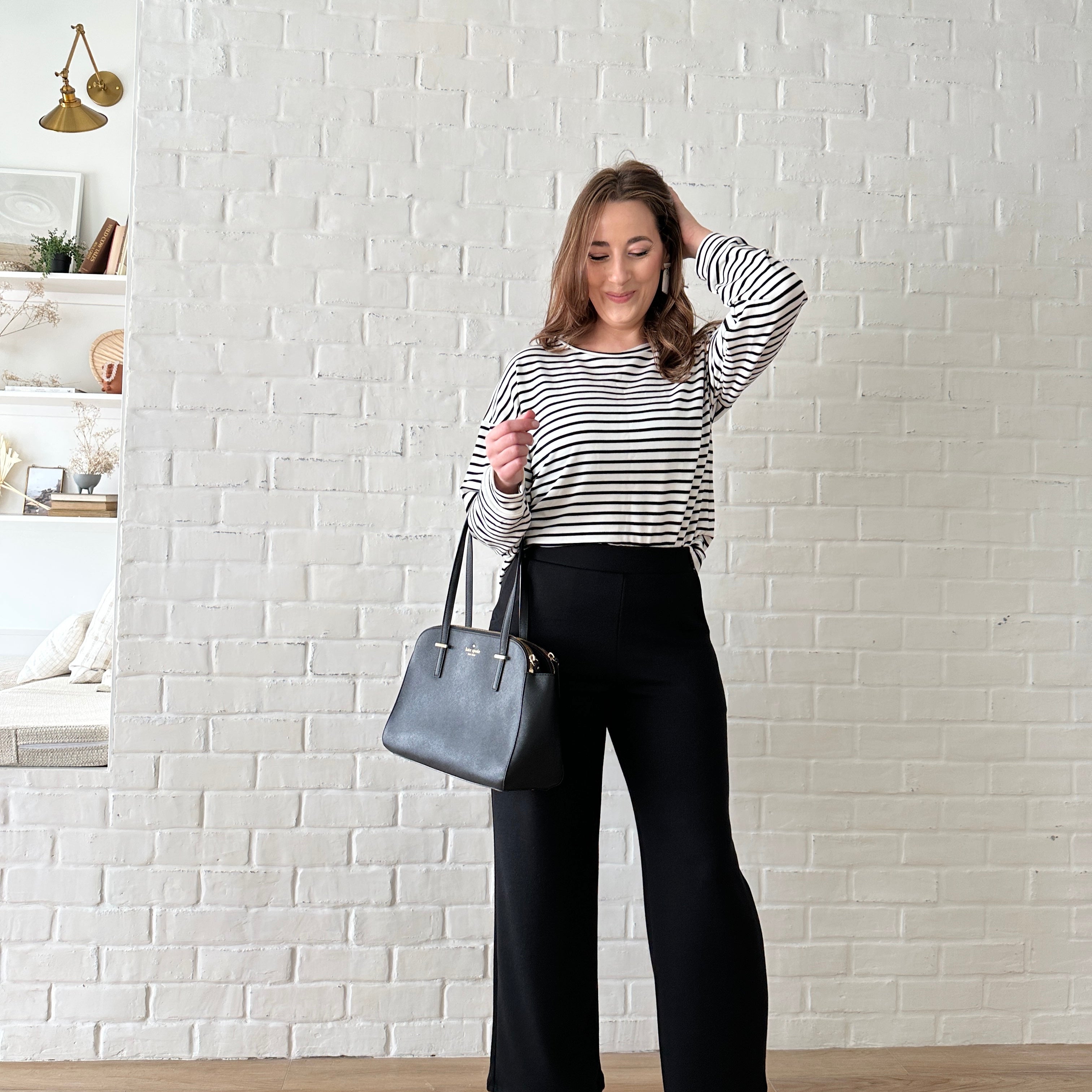 black and white striped top and wide leg pants