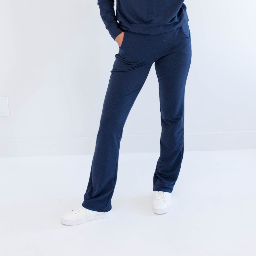 Ang Hill woman wearing navy bamboo wide leg loungewear pants. Made in Canada