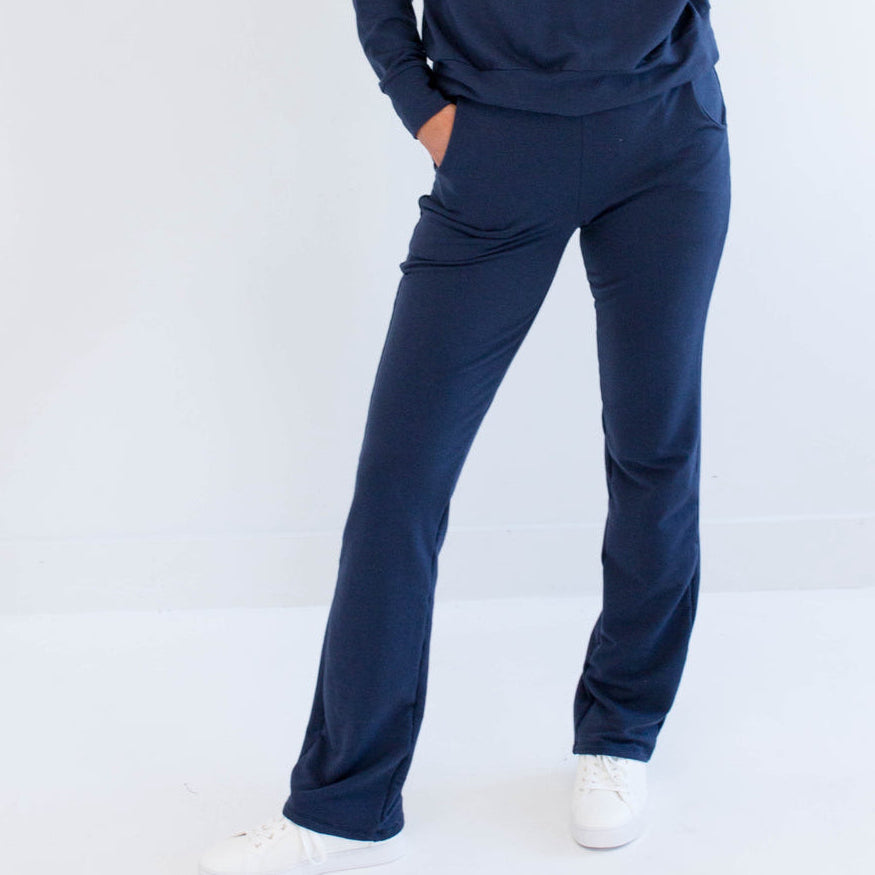 Ang Hill woman wearing navy bamboo wide leg loungewear pants. Made in Canada