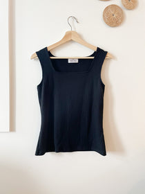 black square neck top hanging on hanger