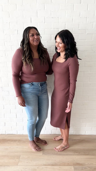 Video of two women modelling brown square neck top and dress