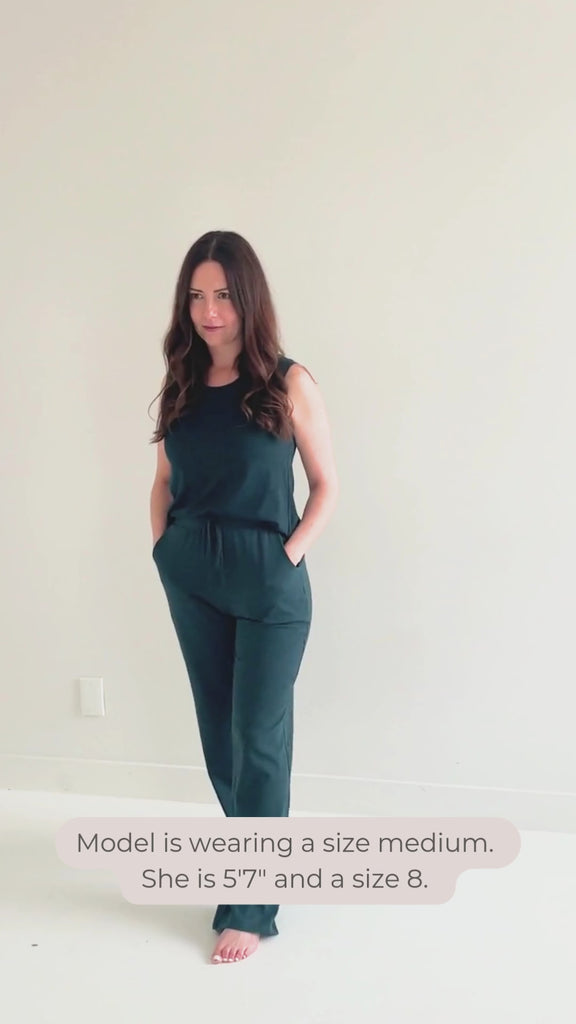 video of model wearing dark green tank top and matching flowy pants apparel made in canada