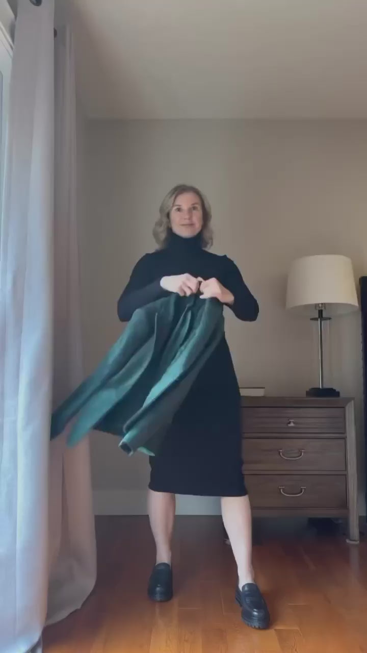 Woman wearing ribbed midi black turtleneck styling it with different jackets and tops. Video format 